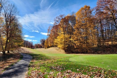 This spacious lot located on St. Ives Golf Course is waiting for on St. Ives Golf Club in Michigan - for sale on GolfHomes.com, golf home, golf lot