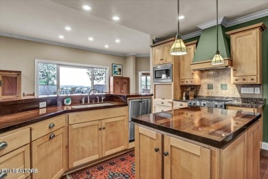 This home is perfectly positioned in the Tellico Village on Tellico Village Golf Club in Tennessee - for sale on GolfHomes.com, golf home, golf lot