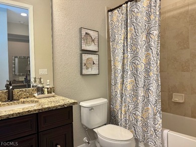 GOLF MEMBERSHIP INCLUDED! The lovely Sophia model on a single on Bonita National Golf Course in Florida - for sale on GolfHomes.com, golf home, golf lot