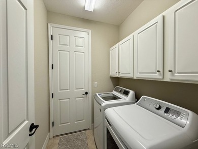 GOLF MEMBERSHIP INCLUDED! The lovely Sophia model on a single on Bonita National Golf Course in Florida - for sale on GolfHomes.com, golf home, golf lot