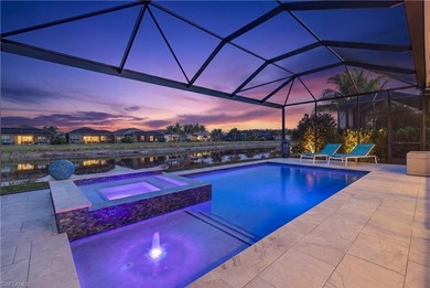 Discover refined lakefront living at 28732 Montecristo Loop in on Palmira Golf and Country Club in Florida - for sale on GolfHomes.com, golf home, golf lot