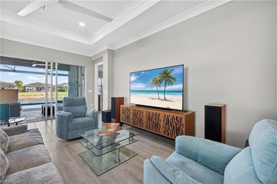 Discover refined lakefront living at 28732 Montecristo Loop in on Palmira Golf and Country Club in Florida - for sale on GolfHomes.com, golf home, golf lot