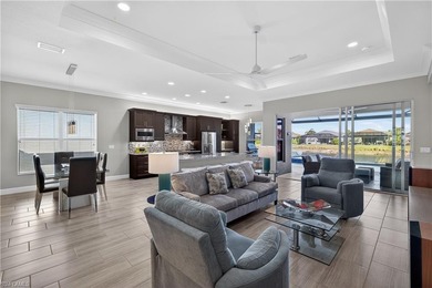 Discover refined lakefront living at 28732 Montecristo Loop in on Palmira Golf and Country Club in Florida - for sale on GolfHomes.com, golf home, golf lot