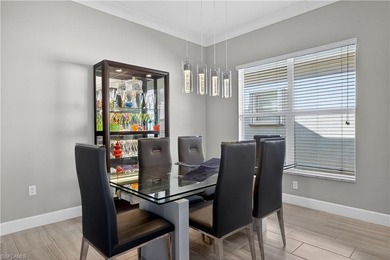 Discover refined lakefront living at 28732 Montecristo Loop in on Palmira Golf and Country Club in Florida - for sale on GolfHomes.com, golf home, golf lot