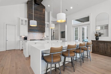 Welcome to 298 Corinthian Place, where elegance meets on Regatta Bay Golf and Country Club in Florida - for sale on GolfHomes.com, golf home, golf lot