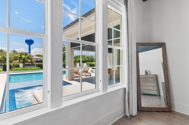 Welcome to 298 Corinthian Place, where elegance meets on Regatta Bay Golf and Country Club in Florida - for sale on GolfHomes.com, golf home, golf lot