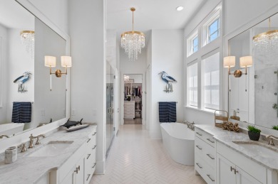Welcome to 298 Corinthian Place, where elegance meets on Regatta Bay Golf and Country Club in Florida - for sale on GolfHomes.com, golf home, golf lot