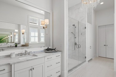 Welcome to 298 Corinthian Place, where elegance meets on Regatta Bay Golf and Country Club in Florida - for sale on GolfHomes.com, golf home, golf lot