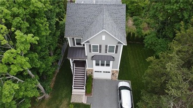 Welcome to your dream retreat in the beautiful, coastal exclave on Potowomut Golf Club in Rhode Island - for sale on GolfHomes.com, golf home, golf lot