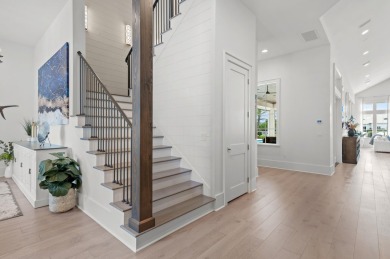 Welcome to 298 Corinthian Place, where elegance meets on Regatta Bay Golf and Country Club in Florida - for sale on GolfHomes.com, golf home, golf lot