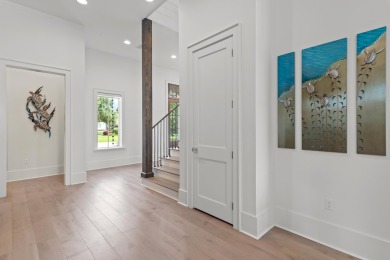 Welcome to 298 Corinthian Place, where elegance meets on Regatta Bay Golf and Country Club in Florida - for sale on GolfHomes.com, golf home, golf lot