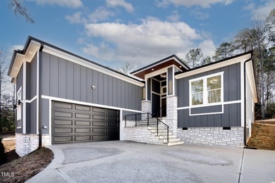 MODERN LUXURY LIVING AT LAKE ROYALE! This custom-built 3BR/3BA on River Golf and County Club at Lake Royale in North Carolina - for sale on GolfHomes.com, golf home, golf lot