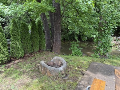 VERY RARE VACANT CREEK lot in the sought after Outdoor Resorts on Bent Creek Golf Course in Tennessee - for sale on GolfHomes.com, golf home, golf lot
