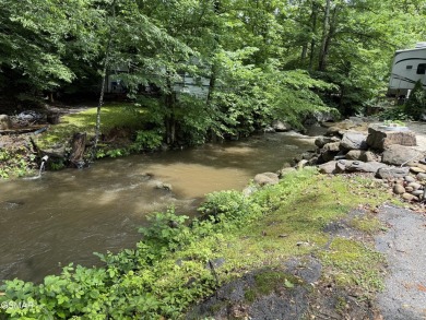 VERY RARE VACANT CREEK lot in the sought after Outdoor Resorts on Bent Creek Golf Course in Tennessee - for sale on GolfHomes.com, golf home, golf lot