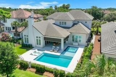 Welcome to 298 Corinthian Place, where elegance meets on Regatta Bay Golf and Country Club in Florida - for sale on GolfHomes.com, golf home, golf lot
