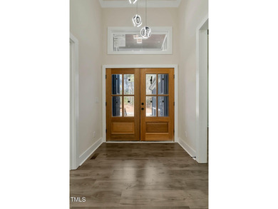 MODERN LUXURY LIVING AT LAKE ROYALE! This custom-built 3BR/3BA on River Golf and County Club at Lake Royale in North Carolina - for sale on GolfHomes.com, golf home, golf lot