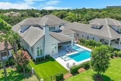 Welcome to 298 Corinthian Place, where elegance meets on Regatta Bay Golf and Country Club in Florida - for sale on GolfHomes.com, golf home, golf lot