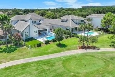 Welcome to 298 Corinthian Place, where elegance meets on Regatta Bay Golf and Country Club in Florida - for sale on GolfHomes.com, golf home, golf lot