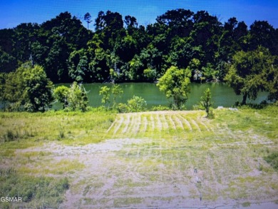 French Broad River lot for sale! Come see this beautiful view on River Islands Golf Club in Tennessee - for sale on GolfHomes.com, golf home, golf lot