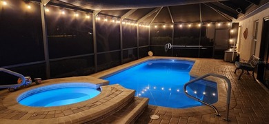 NO BOND! Enjoy resort-style living in this designer 3-bedroom on Nancy Lopez Legacy Golf and Country Club in Florida - for sale on GolfHomes.com, golf home, golf lot