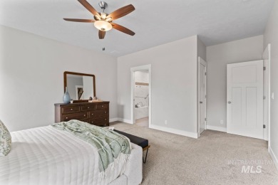 Welcome to this beautifully maintained 4 bedroom, 3 bath home on Hunters Point Golf Club in Idaho - for sale on GolfHomes.com, golf home, golf lot