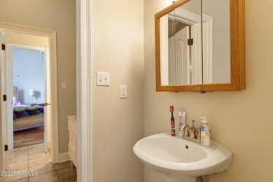 Welcome to this expansive, move-in ready home situated along the on Squirrel Run Golf Courses in Louisiana - for sale on GolfHomes.com, golf home, golf lot