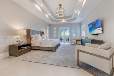 Situated on a prime end lot beside the golf course, this fully on Deering Bay Yacht and Country Club in Florida - for sale on GolfHomes.com, golf home, golf lot