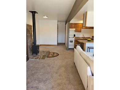 Bright, Fresh, Convenient, Affordable-- All describe this condo on Big Sky of Montana Golf Course in Montana - for sale on GolfHomes.com, golf home, golf lot