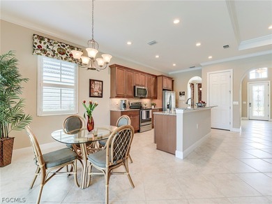 This gorgeous Florencia design, built by WCI, Pelican Preserve's on Pelican Preserve Golf Club in Florida - for sale on GolfHomes.com, golf home, golf lot