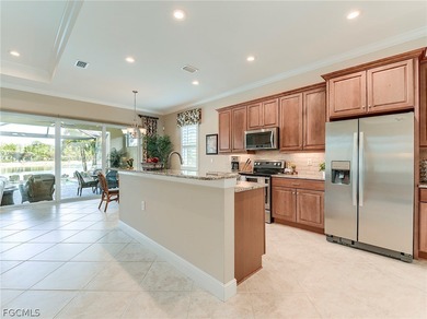 This gorgeous Florencia design, built by WCI, Pelican Preserve's on Pelican Preserve Golf Club in Florida - for sale on GolfHomes.com, golf home, golf lot