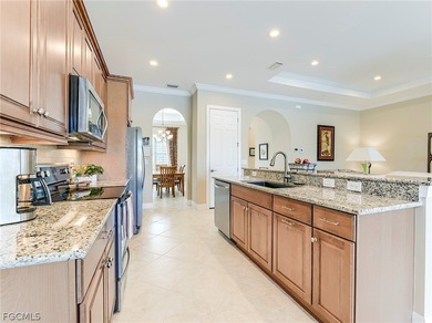 This gorgeous Florencia design, built by WCI, Pelican Preserve's on Pelican Preserve Golf Club in Florida - for sale on GolfHomes.com, golf home, golf lot