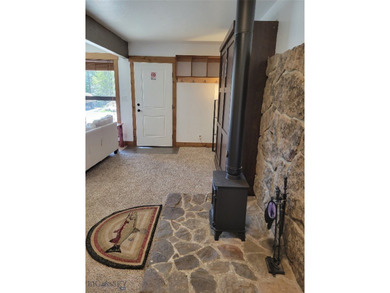 Bright, Fresh, Convenient, Affordable-- All describe this condo on Big Sky of Montana Golf Course in Montana - for sale on GolfHomes.com, golf home, golf lot