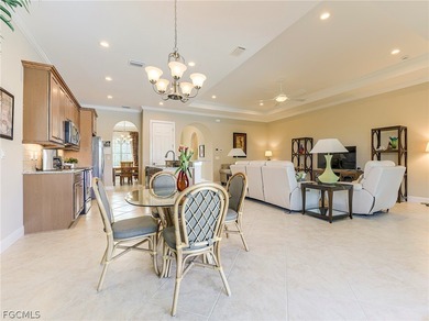This gorgeous Florencia design, built by WCI, Pelican Preserve's on Pelican Preserve Golf Club in Florida - for sale on GolfHomes.com, golf home, golf lot