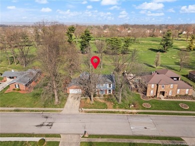 Situated on the 16th hole of Elk Run Golf Course, this spacious on Jeffersonville Elks Golf Club in Indiana - for sale on GolfHomes.com, golf home, golf lot