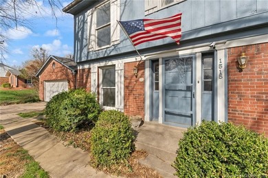 Situated on the 16th hole of Elk Run Golf Course, this spacious on Jeffersonville Elks Golf Club in Indiana - for sale on GolfHomes.com, golf home, golf lot