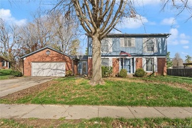 Situated on the 16th hole of Elk Run Golf Course, this spacious on Jeffersonville Elks Golf Club in Indiana - for sale on GolfHomes.com, golf home, golf lot