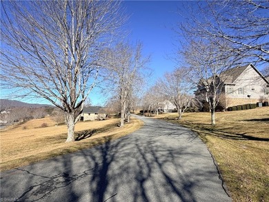 Beautifully laying lot with long range views of Mount Jefferson on Jefferson Landing Club in North Carolina - for sale on GolfHomes.com, golf home, golf lot