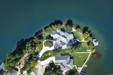 Savor sparkling Lake Balboa views from almost every room at this on Ponce De Leon Golf Course in Arkansas - for sale on GolfHomes.com, golf home, golf lot