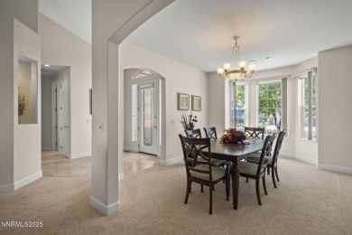 Nestled in a gated golf course community and overlooking serene on Genoa Lakes Golf Club - Lakes Course in Nevada - for sale on GolfHomes.com, golf home, golf lot