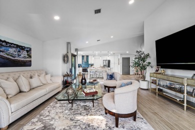 This beautifully renovated home sits on a spacious corner lot on  in Florida - for sale on GolfHomes.com, golf home, golf lot