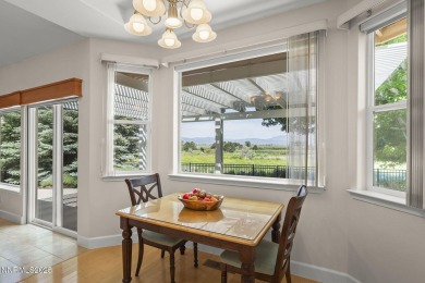 Nestled in a gated golf course community and overlooking serene on Genoa Lakes Golf Club - Lakes Course in Nevada - for sale on GolfHomes.com, golf home, golf lot
