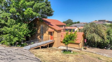 This charming waterfront condo offers a fantastic opportunity to on De Cordova Bend Country Club in Texas - for sale on GolfHomes.com, golf home, golf lot