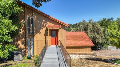This charming waterfront condo offers a fantastic opportunity to on De Cordova Bend Country Club in Texas - for sale on GolfHomes.com, golf home, golf lot