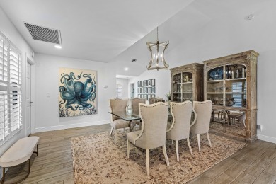 This beautifully renovated home sits on a spacious corner lot on  in Florida - for sale on GolfHomes.com, golf home, golf lot
