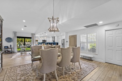 This beautifully renovated home sits on a spacious corner lot on  in Florida - for sale on GolfHomes.com, golf home, golf lot