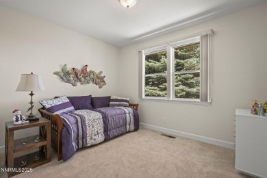 Nestled in a gated golf course community and overlooking serene on Genoa Lakes Golf Club - Lakes Course in Nevada - for sale on GolfHomes.com, golf home, golf lot