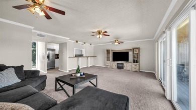 This charming waterfront condo offers a fantastic opportunity to on De Cordova Bend Country Club in Texas - for sale on GolfHomes.com, golf home, golf lot