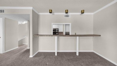 This charming waterfront condo offers a fantastic opportunity to on De Cordova Bend Country Club in Texas - for sale on GolfHomes.com, golf home, golf lot