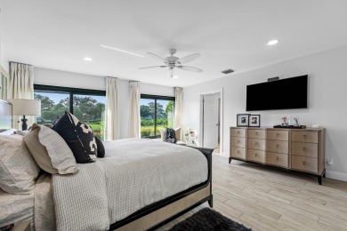 This beautifully renovated home sits on a spacious corner lot on  in Florida - for sale on GolfHomes.com, golf home, golf lot