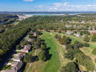 Perched overlooking the golf course, this  two-bedroom on Pointe Royale Village Country Club in Missouri - for sale on GolfHomes.com, golf home, golf lot